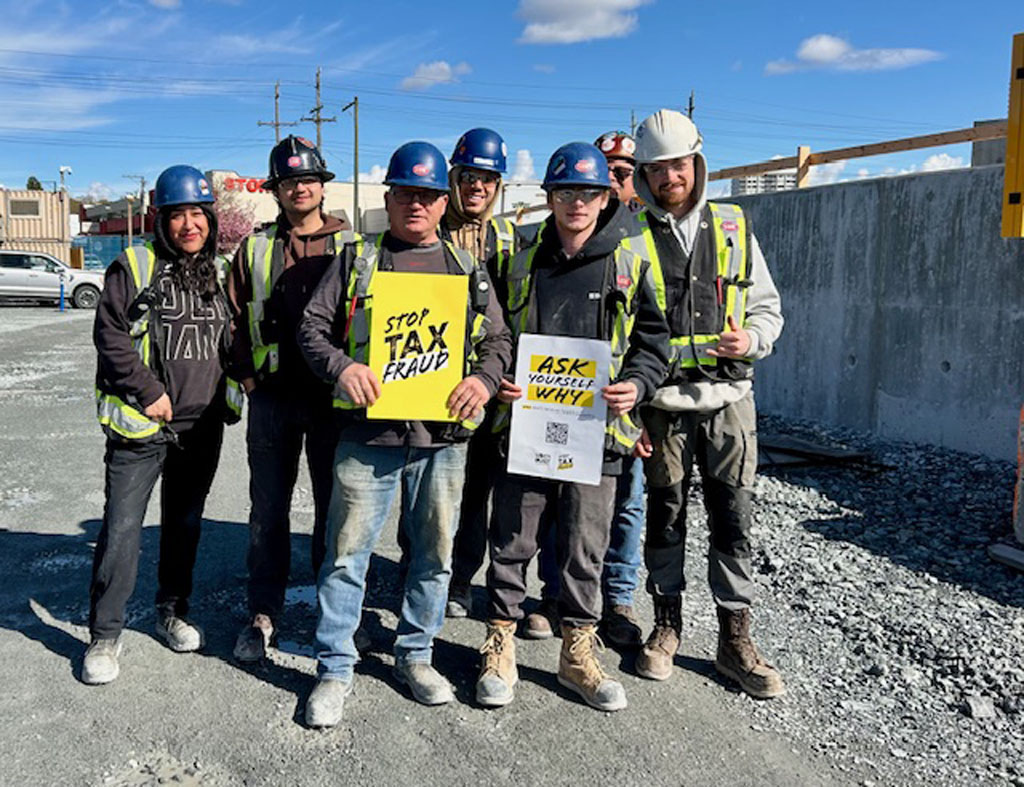 CRC members stand up at the Greenwood Marpole Transit Center in Vancouver, BC