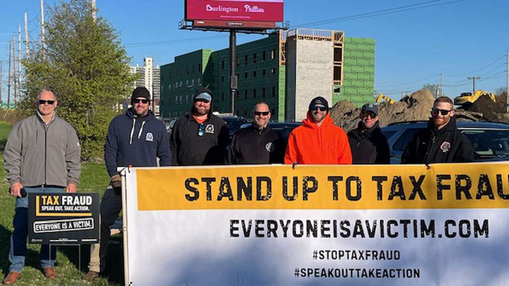 Members in Camden, NJ protest against tax fraud